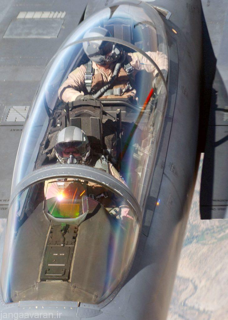 US Air Force (USAF) Captain (CPT) Joseph Cuatero (Pilot), and USAF Major (MAJ) Gary Burg (Weapons System Officer), pictured in the cockpit of their USAF F-15E Strike Eagle aircraft during a refueling mission flown in support of Operation NORTHERN WATCH.